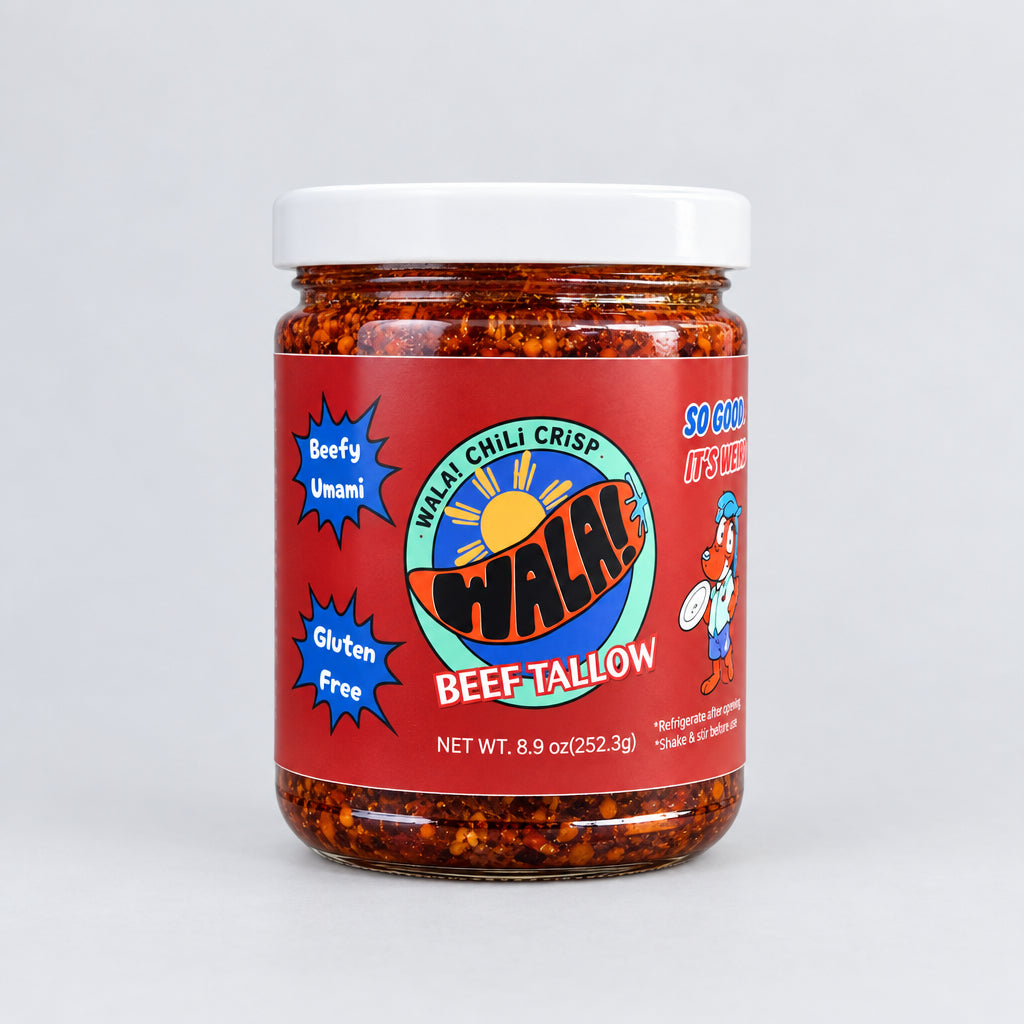 Wala! Beef Tallow Chili Crisp jar on a wooden surface