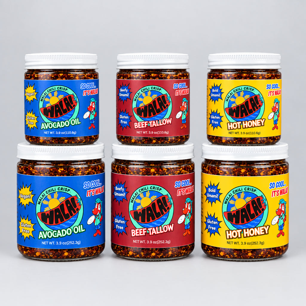 Six Wala! Chili Crisp jars with blue, red and yellow labels on a wooden surface